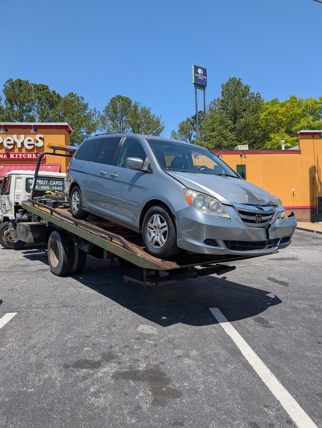 Minivan picked up by Green Guys Recycling
